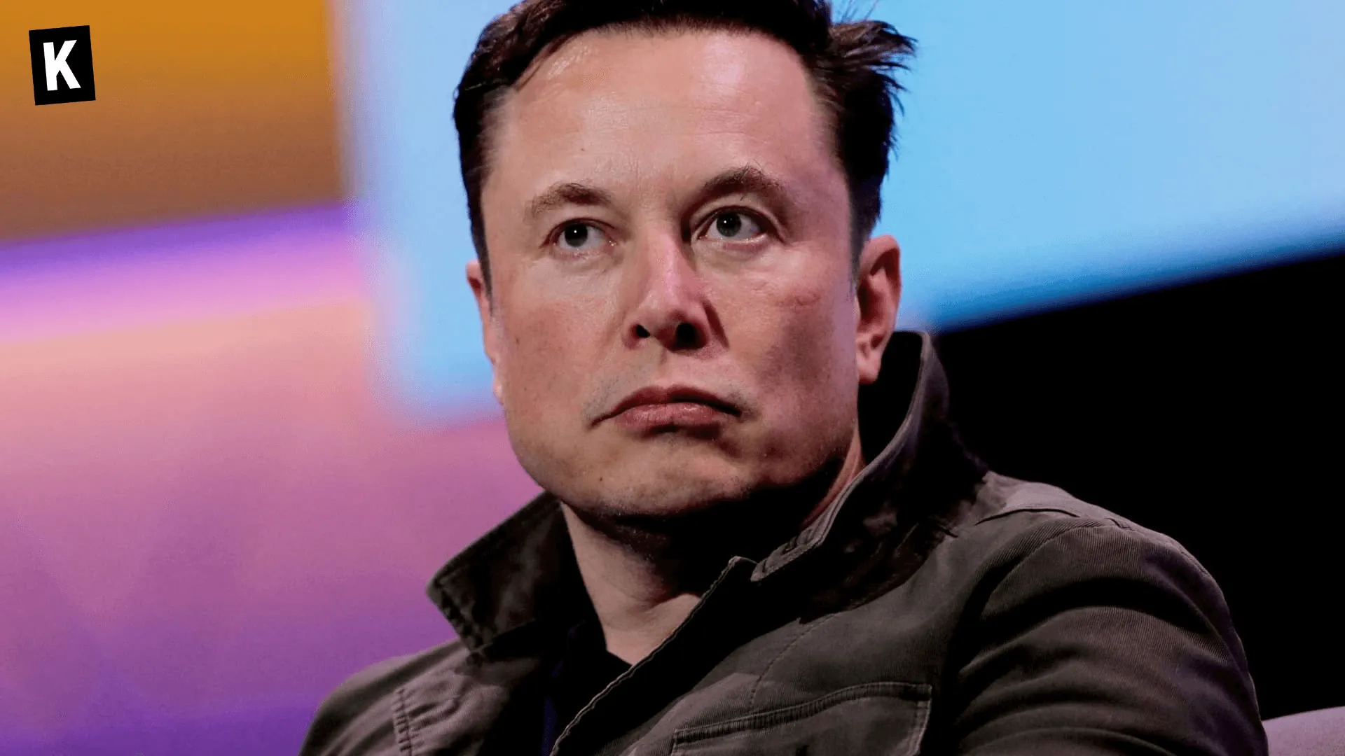 Elon Musk speaking during a conference