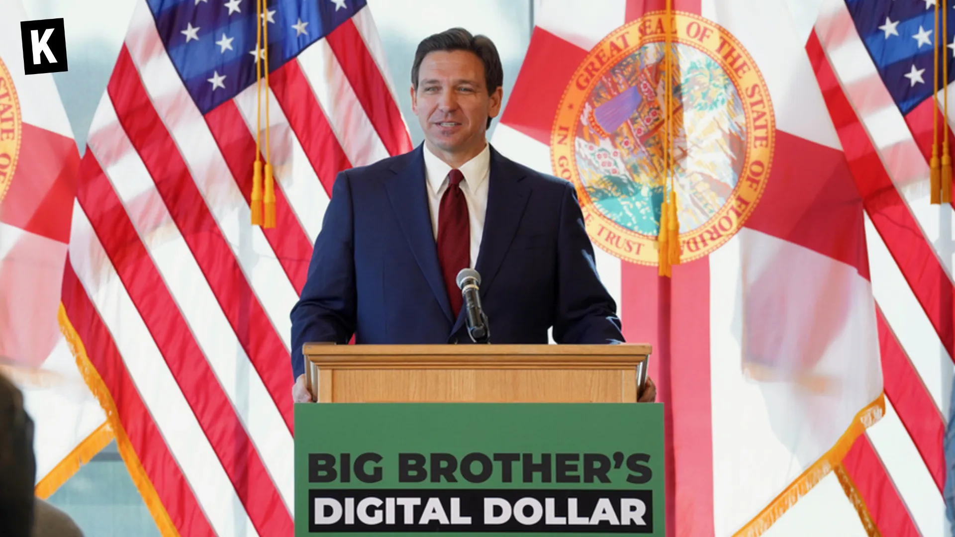 Gov. DeSantis speaking at a lectern reading Big Brother's Digital Dollar