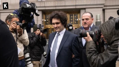 SBF coming out of court after being charged with fraud
