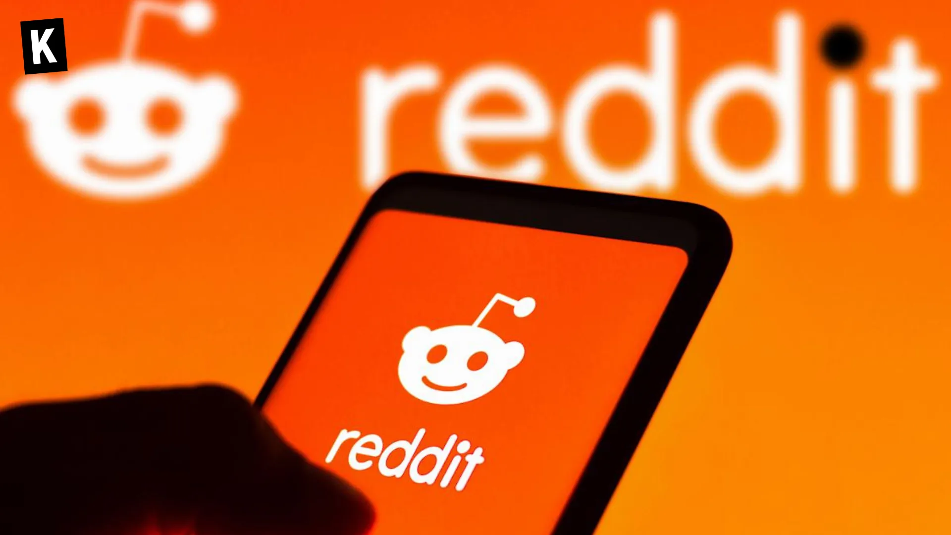 Reddit logo on phone